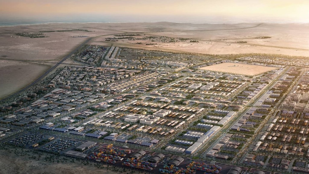 Master-planned Khazaen Economic City and logistics campus aerial view.