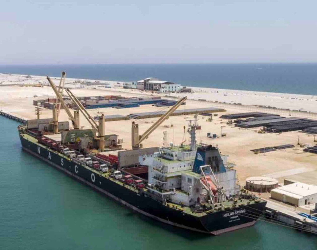 Aerial view of Duqm port, terminals, and coastal development.